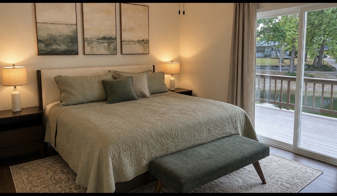 Bedroom with king bed and sliding doors to the deck