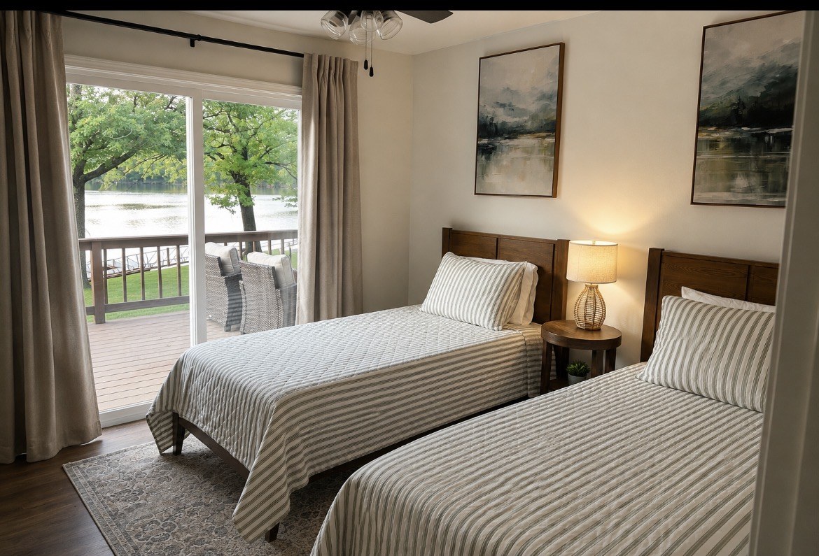 Twin bedroom with sliding doors and lake views